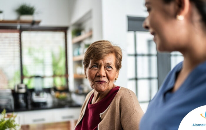 Caregiver provides attentive senior care as part of diabetes awareness